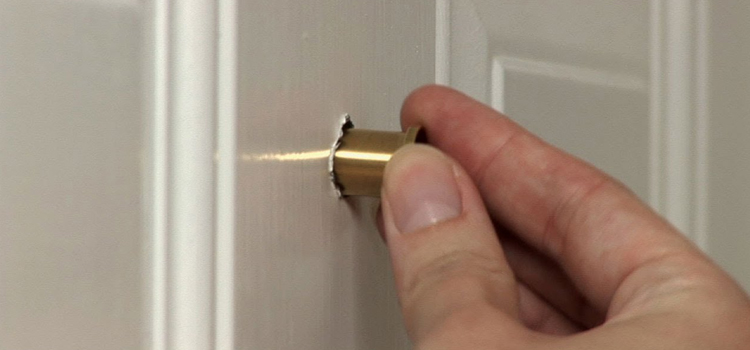 peephole door repair in Oasis